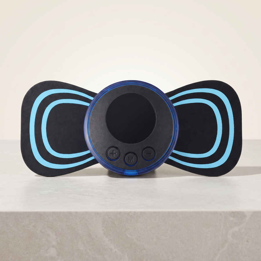 Illustrative front view of the black and turquoise Selorive Mini massage pad